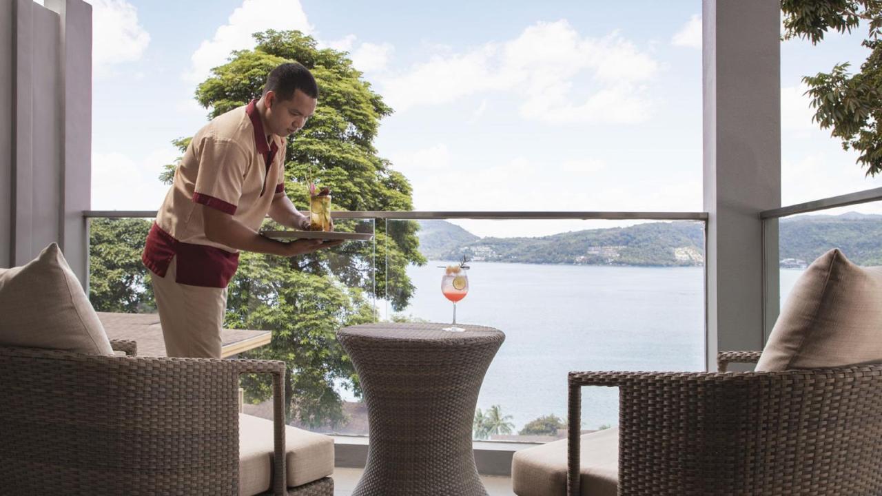 Amari Phuket Hotel Patong Exterior photo A butler at work